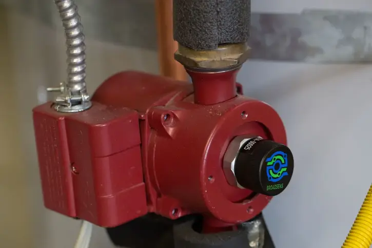 A wireless sensor on an industrial electric motor for vibration monitoring