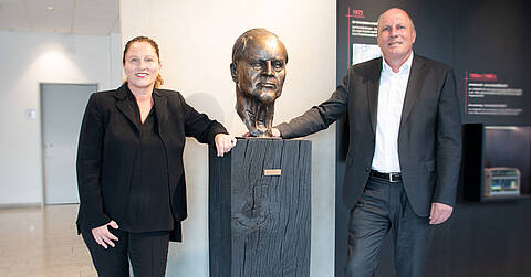 Gabriele Tavella and Thomas Brinkmann with the bust of their father