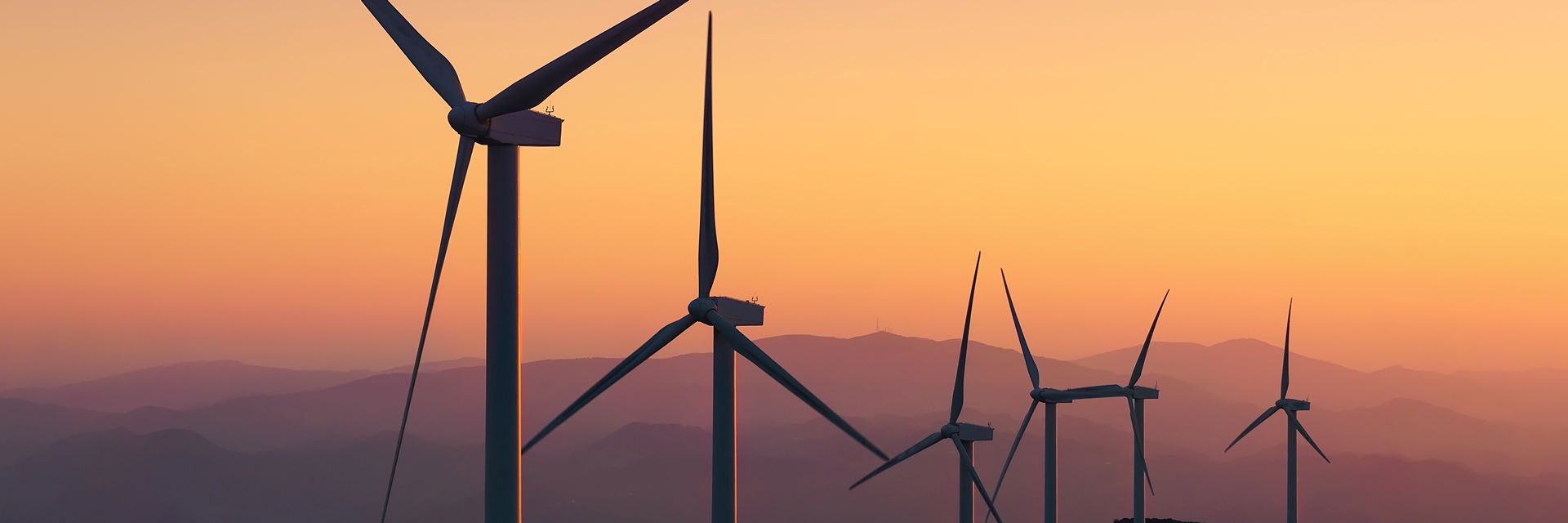 Wind turbines at sunset